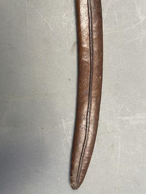 Lot 127 - THREE LEATHER-COVERED WOODEN SCABBARDS, LATE 17TH AND 18TH CENTURIES