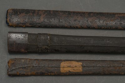 Lot 127 - THREE LEATHER-COVERED WOODEN SCABBARDS, LATE 17TH AND 18TH CENTURIES