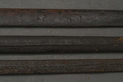 Lot 127 - THREE LEATHER-COVERED WOODEN SCABBARDS, LATE 17TH AND 18TH CENTURIES