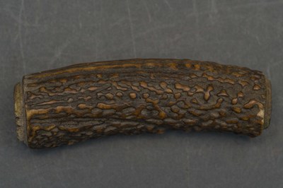 Lot 129 - SIX SWORD GRIPS, 18TH AND 19TH CENTURIES