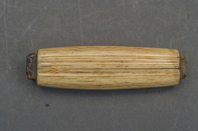 Lot 129 - SIX SWORD GRIPS, 18TH AND 19TH CENTURIES