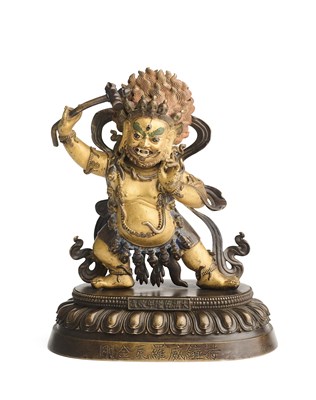 Lot 191 - A SINO-TIBETAN PARCEL GILT BRONZE FIGURE OF MAHAKALA, CHINA, 19TH CENTURY