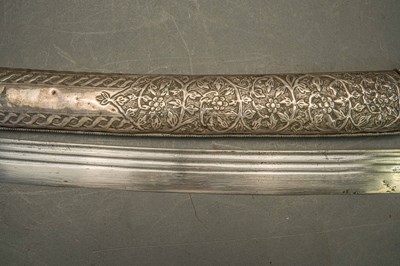 Lot 99 - AN ARAB SILVER-MOUNTED SHAMSHIR, 19TH CENTURY, PROBABLY SYRIA
