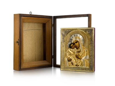 Lot 34 - A RUSSIAN ICON OF THE VLADIMIR MOTHER OF GOD WITH PARCEL-GILT-SILVER OKLAD, MAKER'S MARK GS, MOSCOW, 1908-17