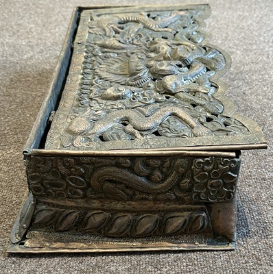 Lot 179 - A COPPER REPOUSSE FOLDING ALTAR TABLE, TIBET, EARLY 20TH CENTURY