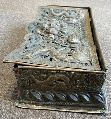 Lot 179 - A COPPER REPOUSSE FOLDING ALTAR TABLE, TIBET, EARLY 20TH CENTURY