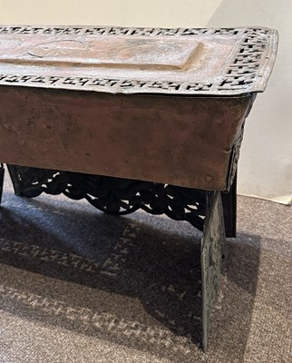 Lot 179 - A COPPER REPOUSSE FOLDING ALTAR TABLE, TIBET, EARLY 20TH CENTURY