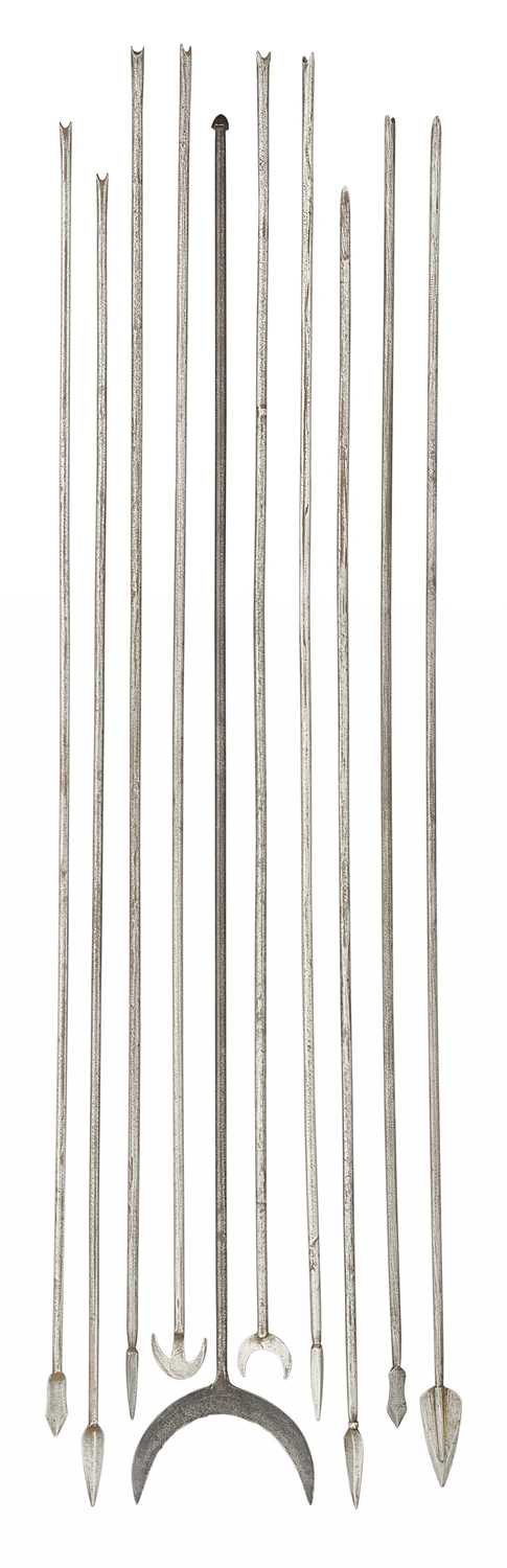 Lot 30 - ELEVEN RARE SOUTH INDIAN ARROWS FORMED ENTIRELY OF STEEL, 17TH/18TH CENTURY.