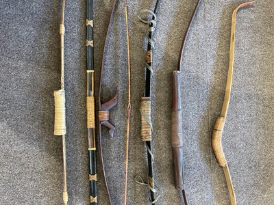 Lot 688 - A THAI PELLET BOW AND FIVE FURTHER SOUTH-EAST ASIAN BOWS, 19TH/20TH CENTURY