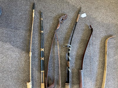 Lot 688 - A THAI PELLET BOW AND FIVE FURTHER SOUTH-EAST ASIAN BOWS, 19TH/20TH CENTURY