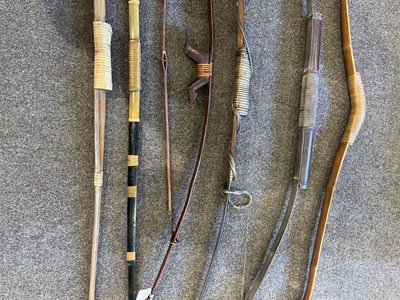 Lot 688 - A THAI PELLET BOW AND FIVE FURTHER SOUTH-EAST ASIAN BOWS, 19TH/20TH CENTURY