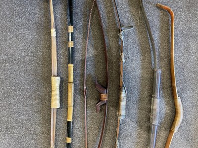 Lot 688 - A THAI PELLET BOW AND FIVE FURTHER SOUTH-EAST ASIAN BOWS, 19TH/20TH CENTURY