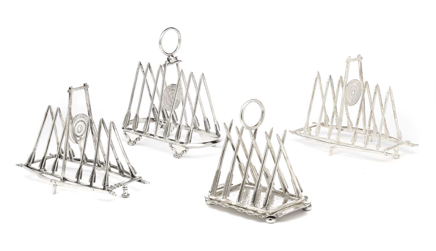 Lot 67 - A PAIR OF VICTORIAN ELECTROPLATE NOVELTY ‘ARCHERY’ TOAST RACKS