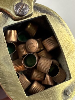 Lot 610 - A THREE-WAY POWDER-FLASK FOR A POCKET PISTOL, CIRCA 1820