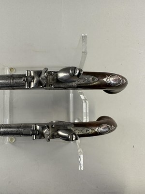 Lot 284 - A PAIR OF 22 BORE SILVER-MOUNTED FLINTLOCK TURN-OFF PISTOLS SIGNED WHATELY, PRIVATE PROOF MARKS, BIRMINGHAM SILVER MARKS, MAKERS MARK OF CHARLES FREETH, CIRCA 1770