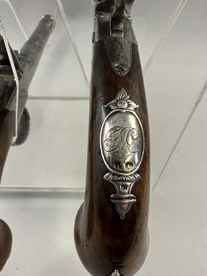 Lot 284 - A PAIR OF 22 BORE SILVER-MOUNTED FLINTLOCK TURN-OFF PISTOLS SIGNED WHATELY, PRIVATE PROOF MARKS, BIRMINGHAM SILVER MARKS, MAKERS MARK OF CHARLES FREETH, CIRCA 1770