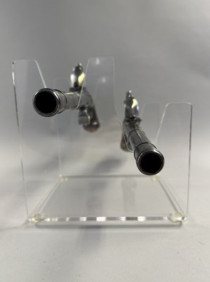 Lot 284 - A PAIR OF 22 BORE SILVER-MOUNTED FLINTLOCK TURN-OFF PISTOLS SIGNED WHATELY, PRIVATE PROOF MARKS, BIRMINGHAM SILVER MARKS, MAKERS MARK OF CHARLES FREETH, CIRCA 1770