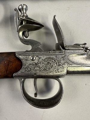 Lot 284 - A PAIR OF 22 BORE SILVER-MOUNTED FLINTLOCK TURN-OFF PISTOLS SIGNED WHATELY, PRIVATE PROOF MARKS, BIRMINGHAM SILVER MARKS, MAKERS MARK OF CHARLES FREETH, CIRCA 1770
