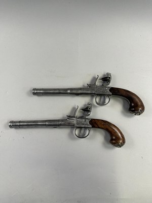 Lot 284 - A PAIR OF 22 BORE SILVER-MOUNTED FLINTLOCK TURN-OFF PISTOLS SIGNED WHATELY, PRIVATE PROOF MARKS, BIRMINGHAM SILVER MARKS, MAKERS MARK OF CHARLES FREETH, CIRCA 1770