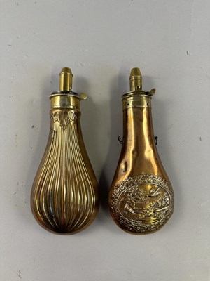 Lot 611 - □ FIVE COPPER ALLOY POWDER-FLASKS, 19TH CENTURY AND LATER