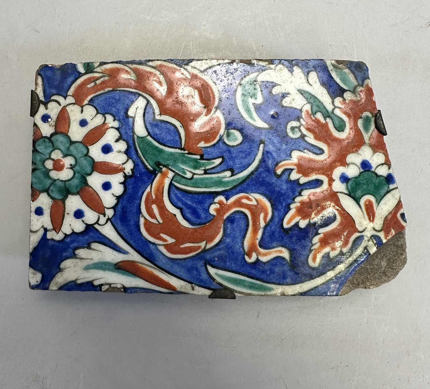 Lot 127 - AN IZNIK TILE FRAGMENT, OTTOMAN ANATOLIA,