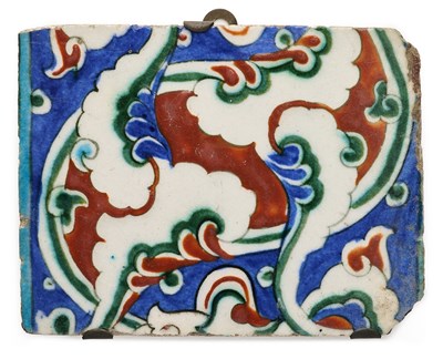 Lot 125 - AN IZNIK BORDER TILE SECTION, OTTOMAN ANATOLIA, CIRCA 1570