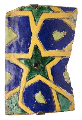 Lot 120 - A TIMURID CUERDA SECA TILE FRAGMENT, CENTRAL ASIA, CIRCA 15TH CENTURY