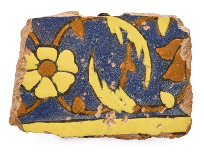 Lot 154 - A MUGHAL CUERDA SECA BORDER TILE FRAGMENT, PUNJAB, MID-17TH CENTURY