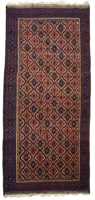 Lot 30 - A BALUCH LONG RUG, EAST PERSIA, 20TH CENTURY