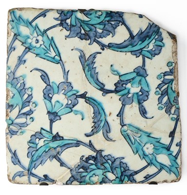 Lot 160 - AN IZNIK BLUE AND WHITE TILE, OTTOMAN ANATOLIA, 17TH CENTURY