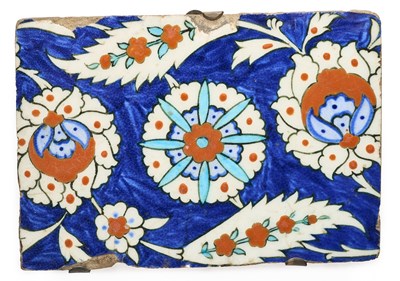 Lot 158 - AN IZNIK BORDER TILE FRAGMENT, OTTOMAN ANATOLIA, CIRCA 1580