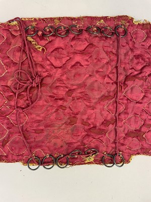 Lot 8 - A PADDED VELVET ARM GUARD, RAJASTHAN OR DECCAN, 18TH CENTURY