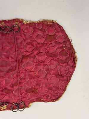 Lot 8 - A PADDED VELVET ARM GUARD, RAJASTHAN OR DECCAN, 18TH CENTURY