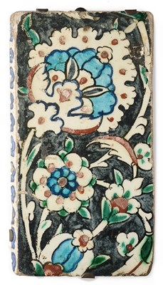 Lot 147 - AN IZNIK BORDER TILE, OTTOMAN ANATOLIA, 17TH CENTURY