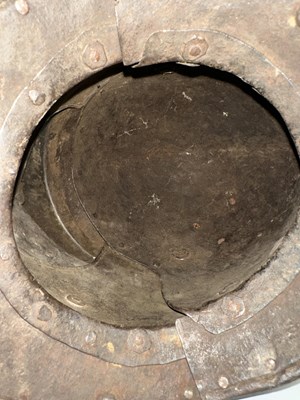 Lot 230 - A NORTH ITALIAN CLOSE HELMET, FIRST QUARTER OF THE 17TH CENTURY