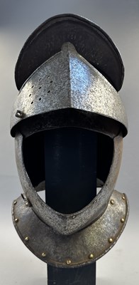 Lot 230 - A NORTH ITALIAN CLOSE HELMET, FIRST QUARTER OF THE 17TH CENTURY