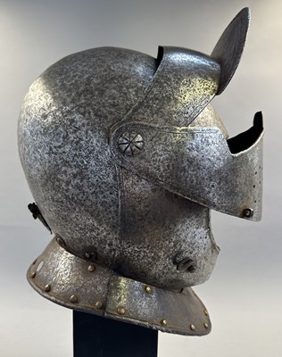 Lot 230 - A NORTH ITALIAN CLOSE HELMET, FIRST QUARTER OF THE 17TH CENTURY