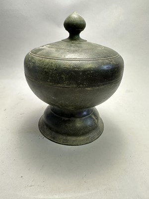 Lot 386 - A KHMER BRONZE RELIQUARY, CAMBODIA, CIRCA 12TH CENTURY