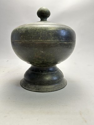 Lot 386 - A KHMER BRONZE RELIQUARY, CAMBODIA, CIRCA 12TH CENTURY