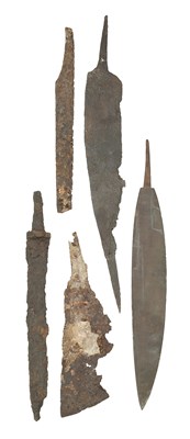 Lot 130 - A NORTH EUROPEAN SCRAMASAX, PROBABLY 7TH/9TH CENTURY AND FOUR FURTHER IRON EDGED WEAPONS