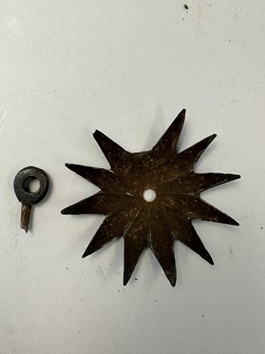 Lot 181 - A RARE ZISCHÄGGE OF SIEGE WEIGHT, MID-17TH CENTURY, SOUTH GERMAN OR EAST EUROPEAN