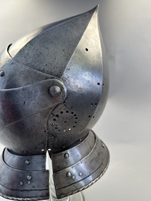 Lot 176 - A RARE SOUTH GERMAN CLOSE HELMET, CIRCA 1560