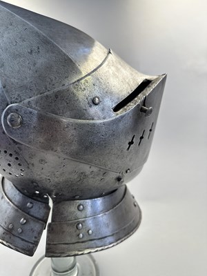Lot 176 - A RARE SOUTH GERMAN CLOSE HELMET, CIRCA 1560