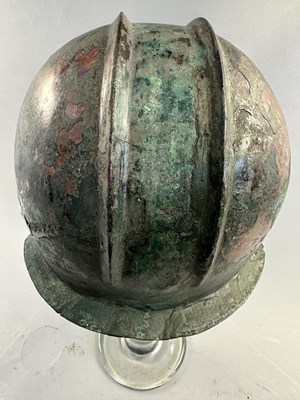 Lot 258 - A GREEK BRONZE HELMET OF ILLYRIAN TYPE, 6TH-5TH CENTURY B.C.