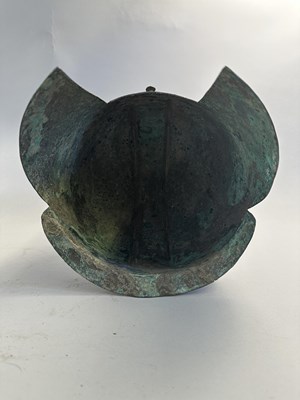 Lot 258 - A GREEK BRONZE HELMET OF ILLYRIAN TYPE, 6TH-5TH CENTURY B.C.