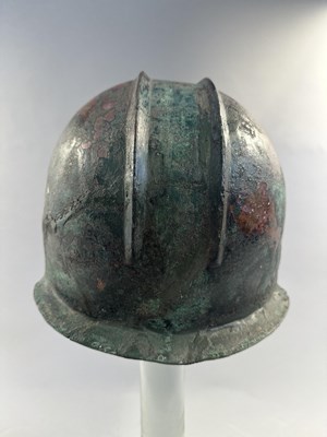 Lot 258 - A GREEK BRONZE HELMET OF ILLYRIAN TYPE, 6TH-5TH CENTURY B.C.