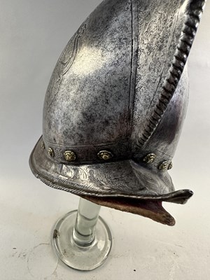 Lot 170 - A COMPOSITE NORTH ITALIAN CAP-A-PIE ARMOUR WITH ETCHED DECORATION, LATE 16TH CENTURY, THE BACKPLATE SIGNED BY THE MASTER ‘P’