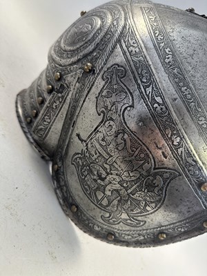 Lot 170 - A COMPOSITE NORTH ITALIAN CAP-A-PIE ARMOUR WITH ETCHED DECORATION, LATE 16TH CENTURY, THE BACKPLATE SIGNED BY THE MASTER ‘P’