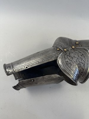 Lot 170 - A COMPOSITE NORTH ITALIAN CAP-A-PIE ARMOUR WITH ETCHED DECORATION, LATE 16TH CENTURY, THE BACKPLATE SIGNED BY THE MASTER ‘P’