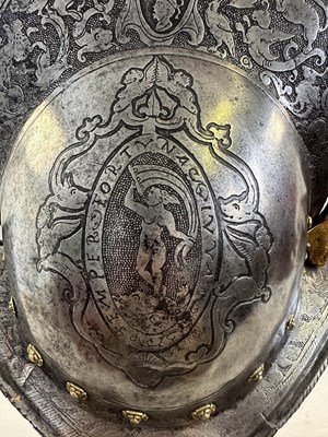 Lot 170 - A COMPOSITE NORTH ITALIAN CAP-A-PIE ARMOUR WITH ETCHED DECORATION, LATE 16TH CENTURY, THE BACKPLATE SIGNED BY THE MASTER ‘P’